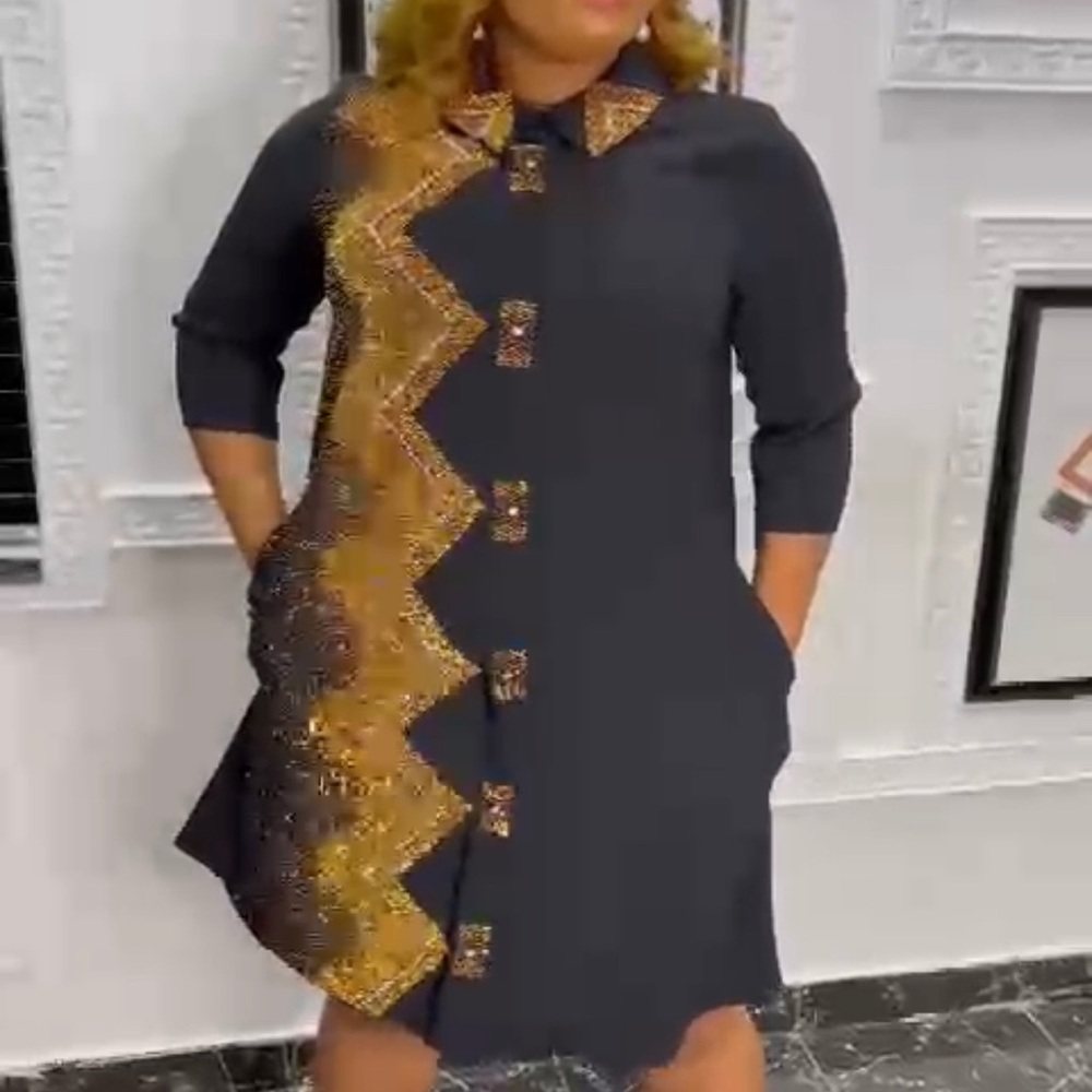 Black dress with gold stone. Size 14,16 and 18 available. Brand New with tag